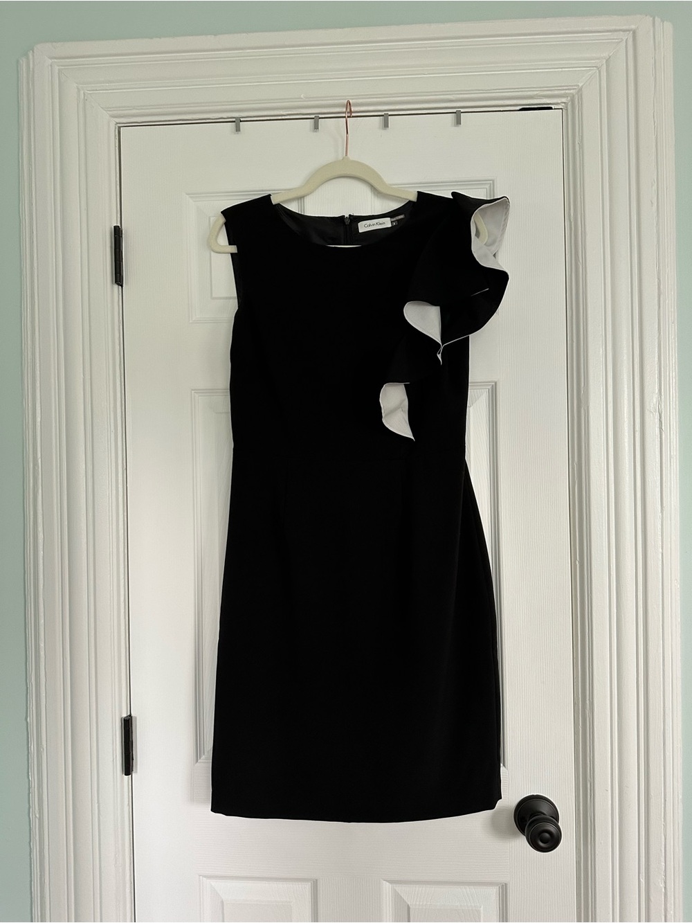 Sleeveless Black Cocktail Dress with White-Trim Ruffle